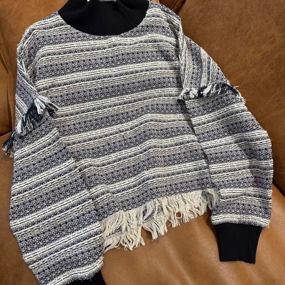Elegant Black and White Fringed Turtleneck Sweater - Picture 1 of 2